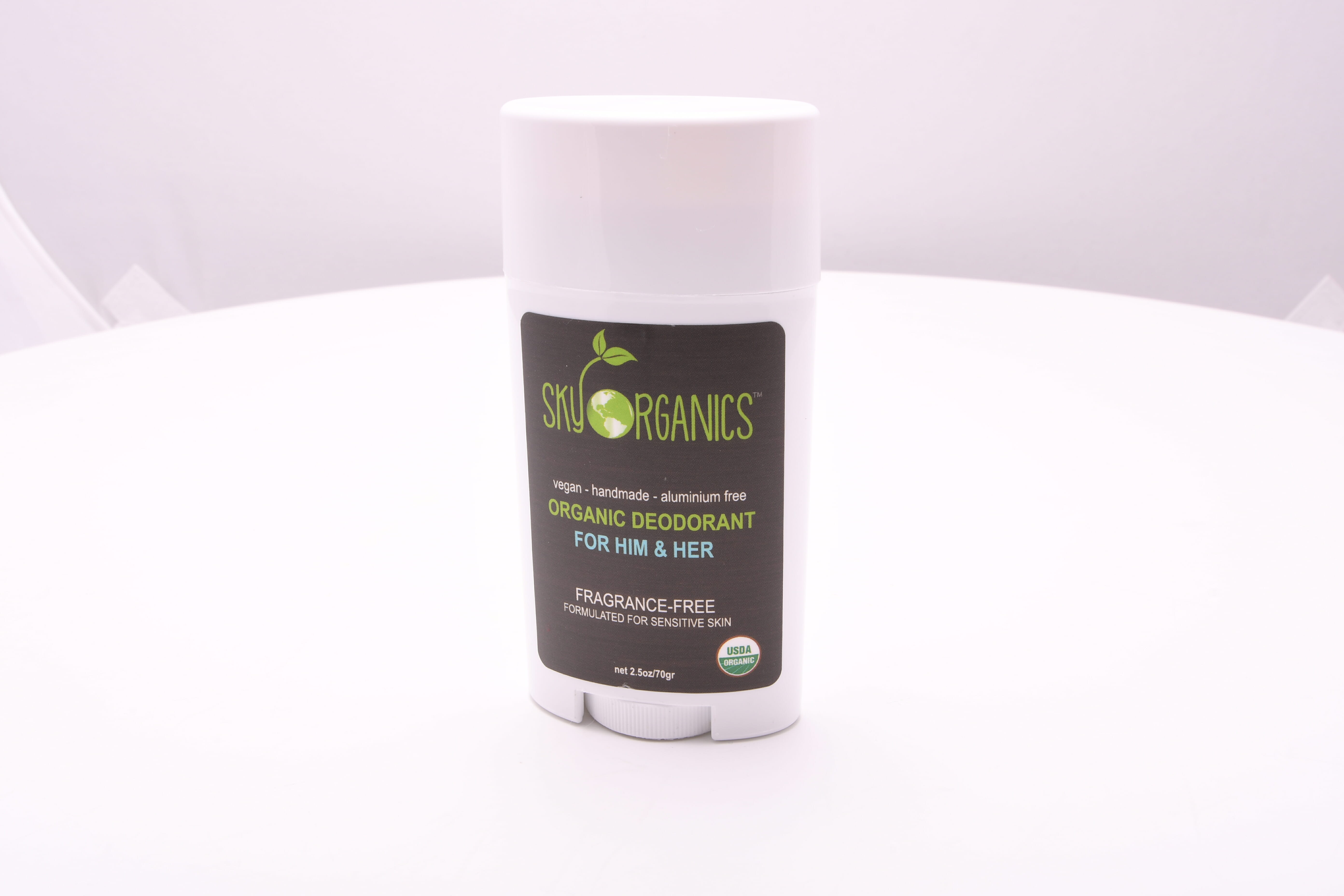 An example of a solid stick deodorant, marketed as "vegan" and "organic."
