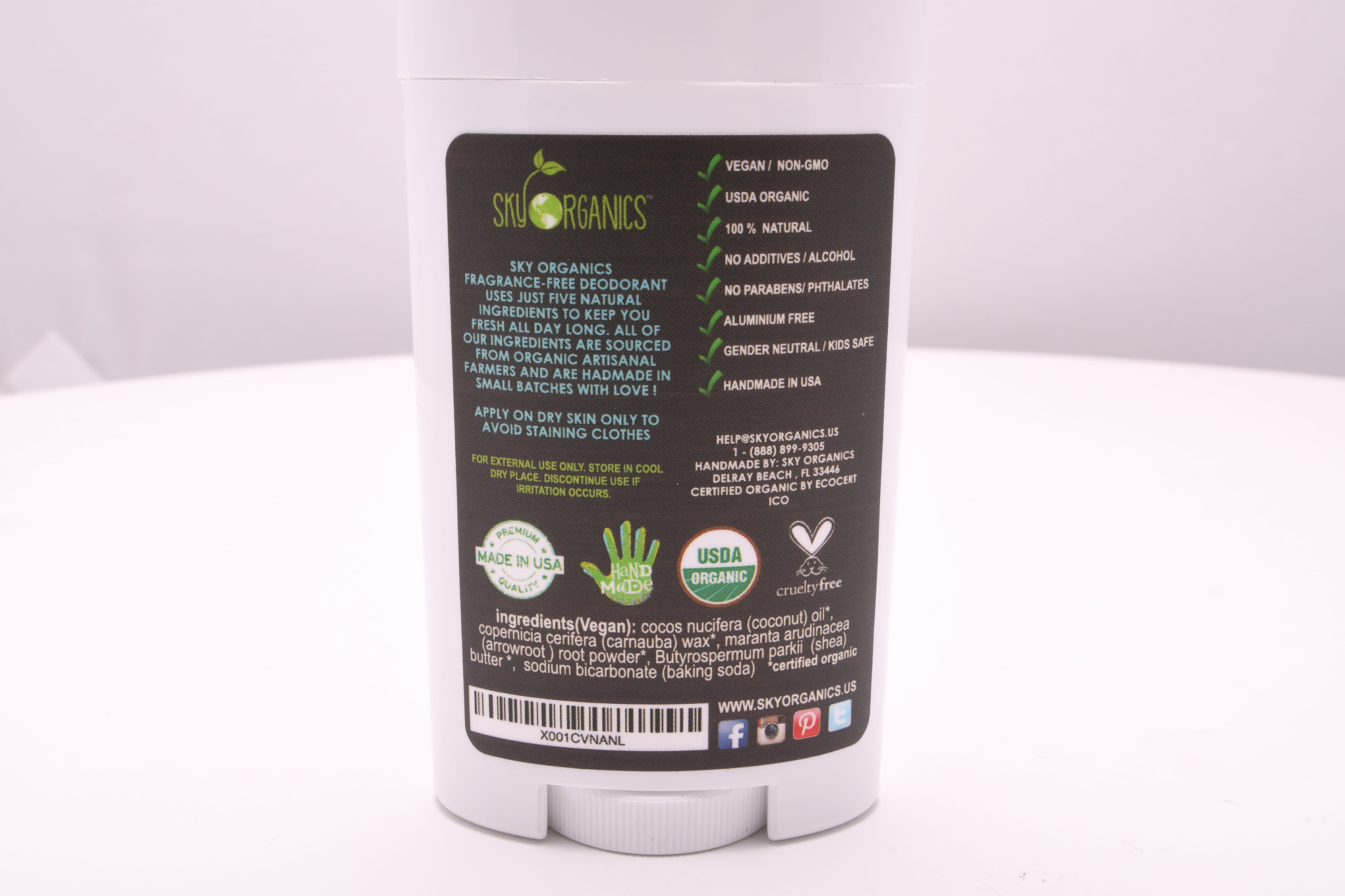 The backside of the vegan-organic deodorant, listing its ingredients and processes.