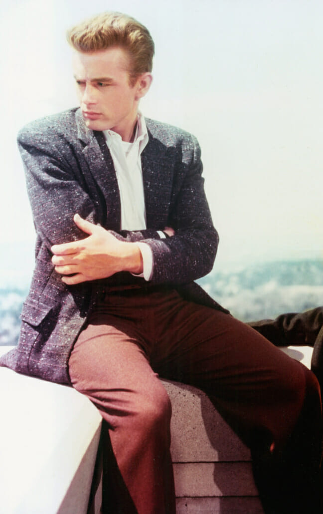 James Dean in Rebel Without a Cause, wearing a sports coat, odd trousers, and collared shirt.