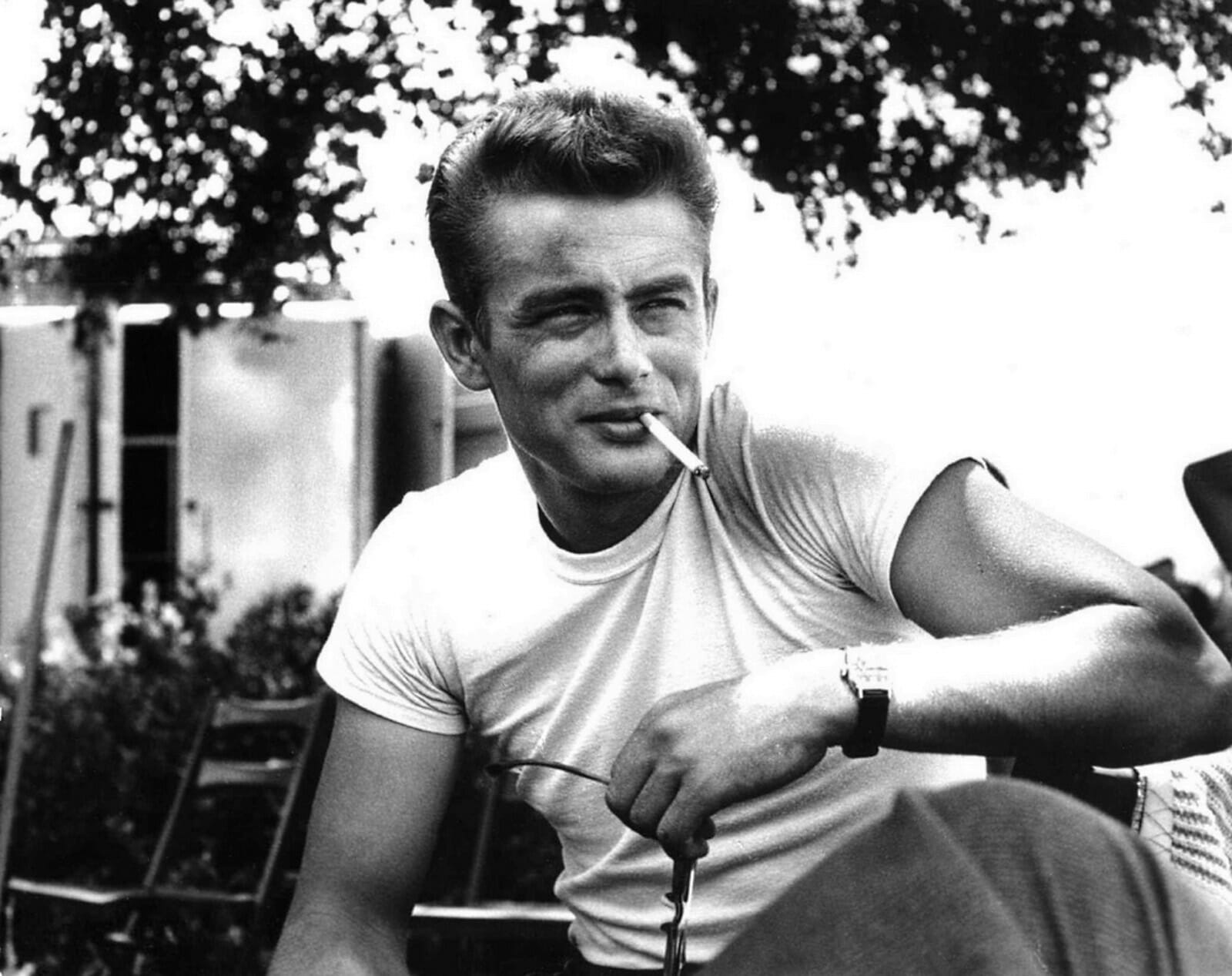 Dean on the set of Rebel Without a Cause, in a simple white T-shirt.