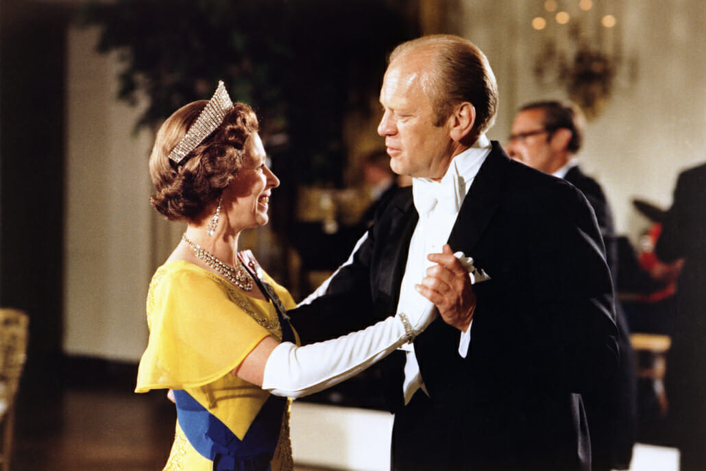 President Gerald Ford, in white tie, dances with Queen Elizabeth II at a state dinner in 1976.
