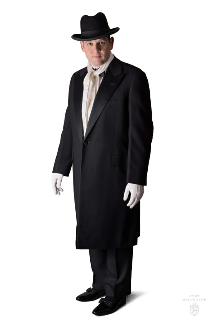 Evening Overcoat with Homburg Hat, silk scarf and white gloves for a black tie tuxedo ensemble