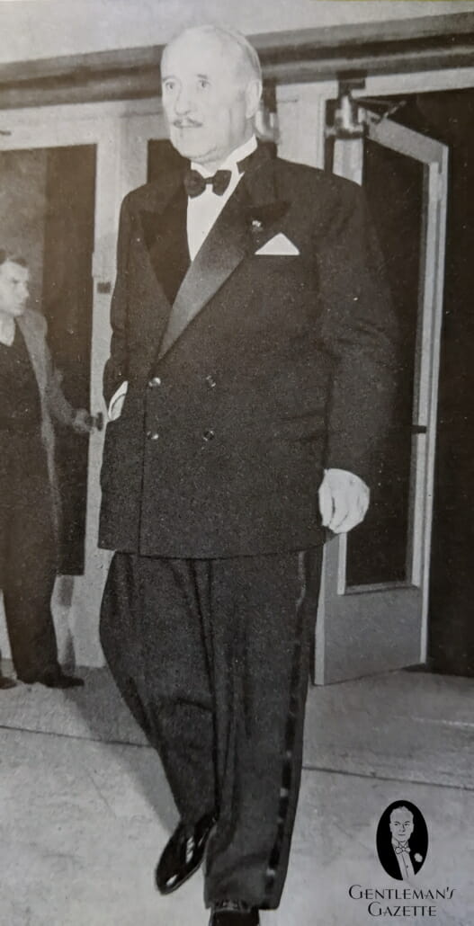 Francois Poncet in DB tuxedo with wing collar, patent leather shoes and galon stripe in 1950
