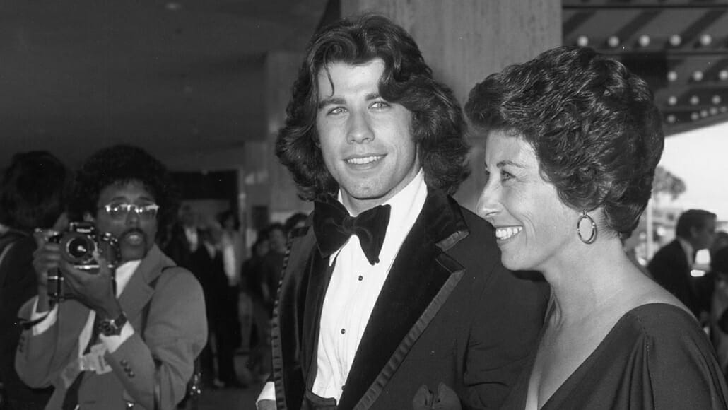 John Travolta at the Emmys in the 70s with huge velvet bow tie, and piped notch lapels