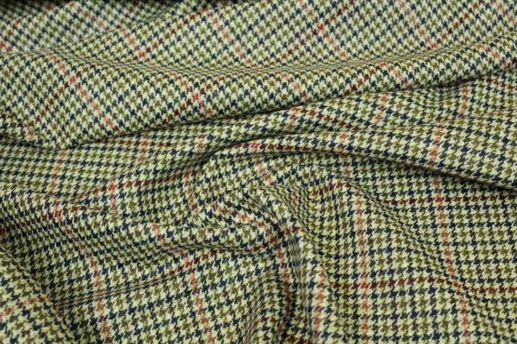 A Fine Lambswool Tweed In A Houndstooth Pattern A fine lambswool tweed in a houndstooth pattern