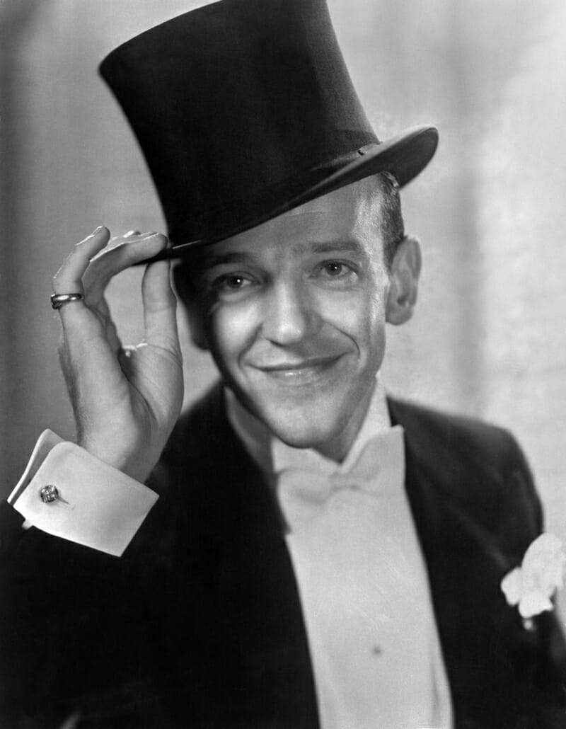 Astaire in white tie with silk top hat, double sided diamond cufflinks and pinky ring