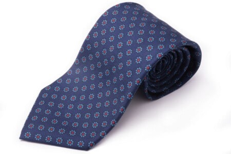 A photograph of a dark blue, light blue and Madder Red Silk Tie by Fort Belvedere
