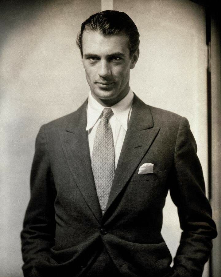 Gary Cooper with a lower gorge to downplay his height