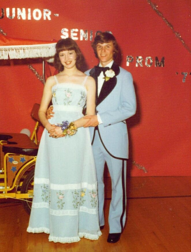 Hideous light blue tuxedo with seventies huge bow tie and boutonniere