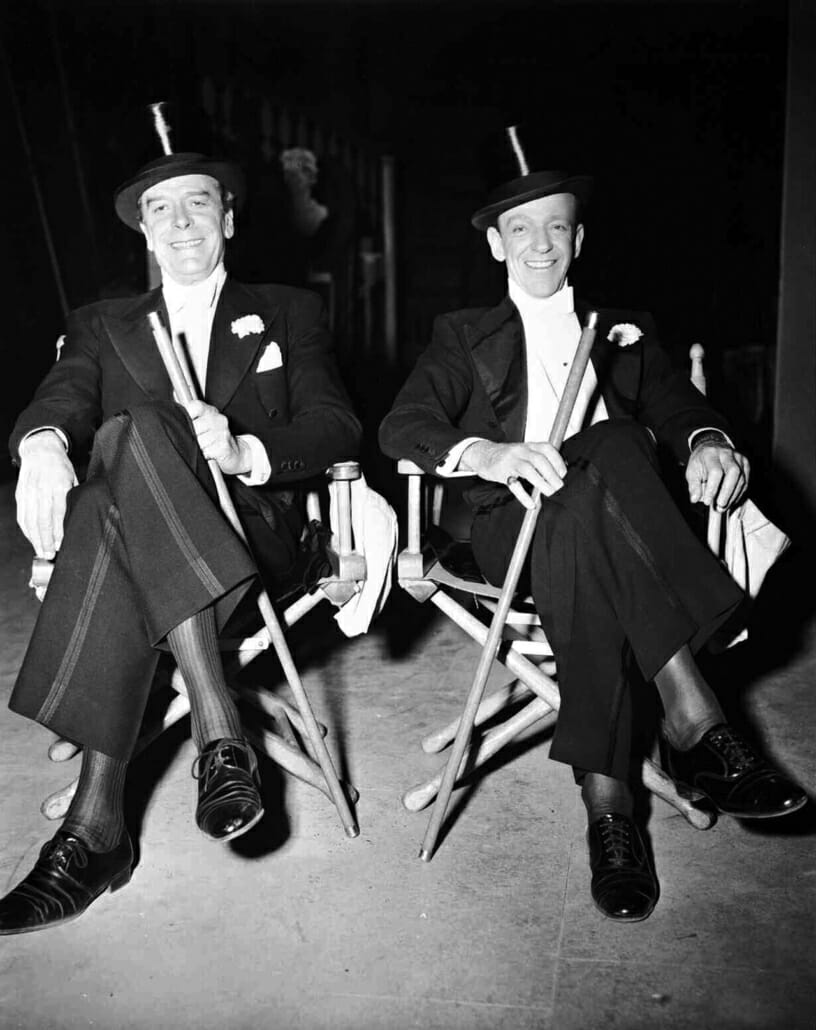 Jack Buchanan with ribbed silk socks and derby shoes in white tie, Fred Astaire with cross laced captoe oxfords both in white tie