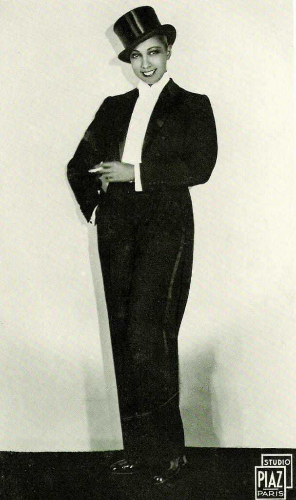 Josephine Baker smoking in white tie