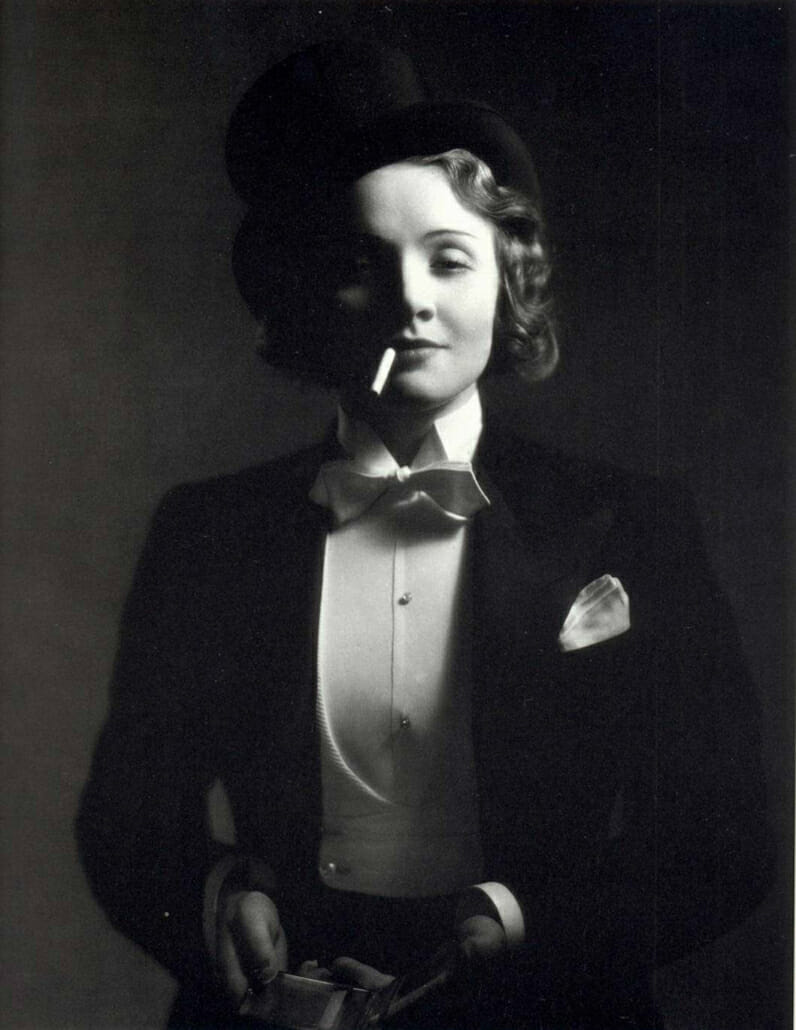 Marlene Dietrich with Cigarette in white tie tailcoat