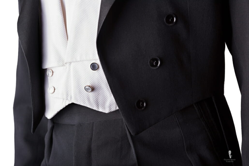 The buttons on a tailcoat are purely decorative