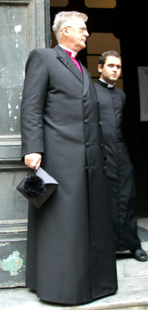 The cassock overcoat is a more modern option compared to the cappa nigra and is sometimes called a greca