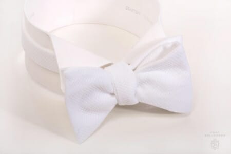 Traditional Semi Butterfly bow tie in Marcella Pique - sized and self tie - the classic option for gentlemen