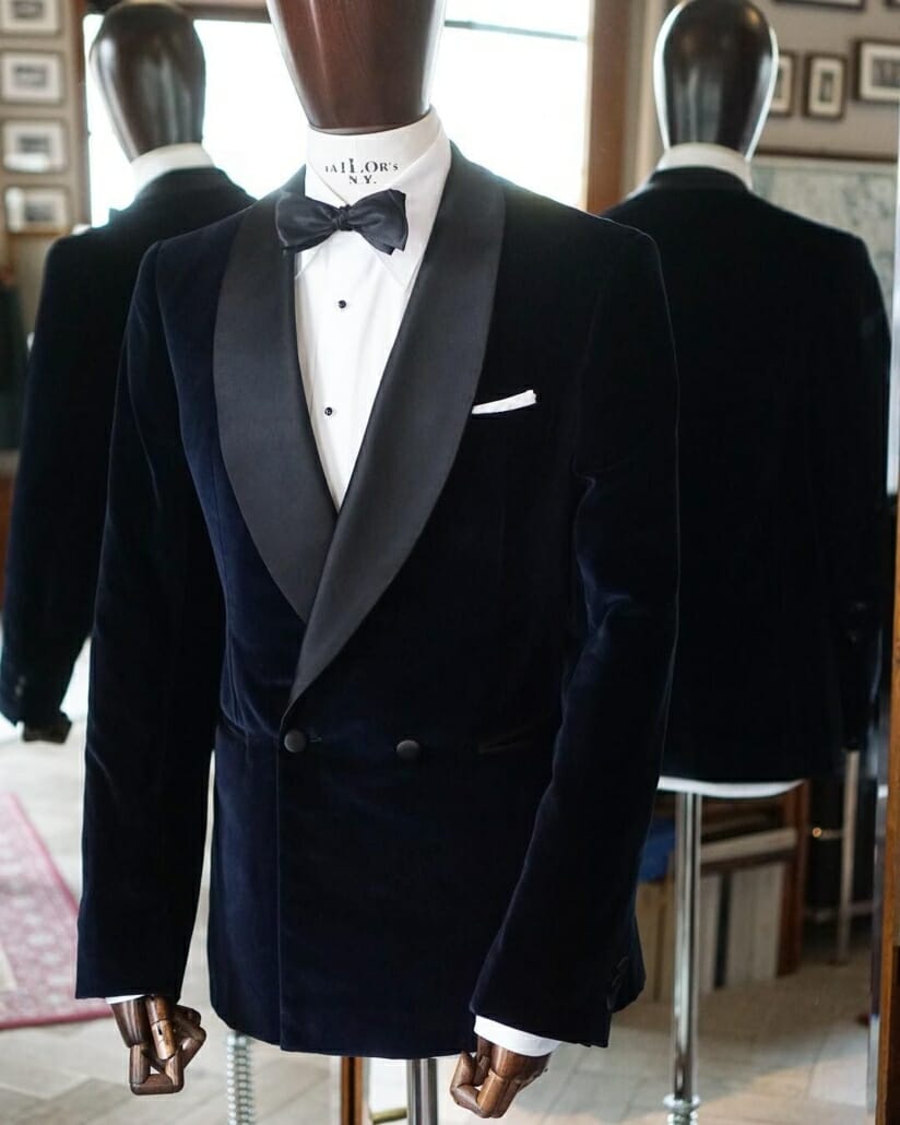Two button DB navy velvet dinner jacket with shawl collar by Zaremba bespoke