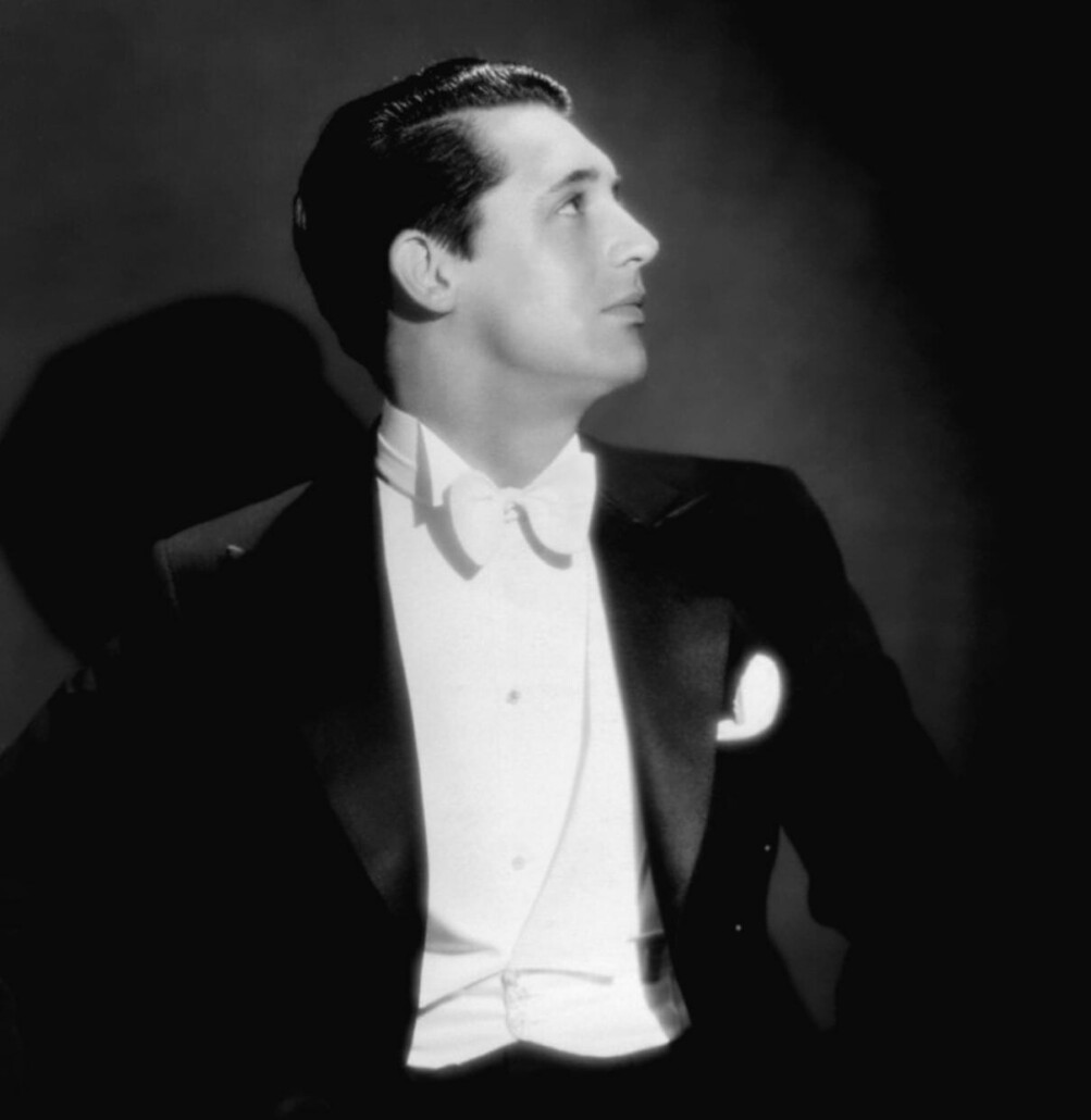 Young Cary Grant in white tie, not the tiny bow tie knot and low profile rounded waistcoat tips