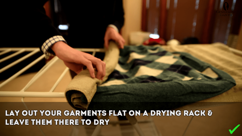 Lay your garments flat on a drying rack and leave it to dry