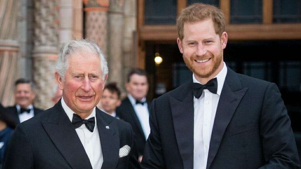 Prince Charles and Prince Willian in black suits