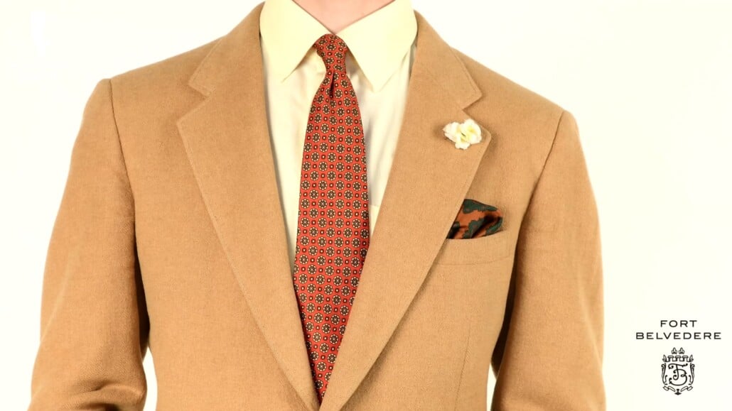 Preston wearing a madder silk tie and pocket square.