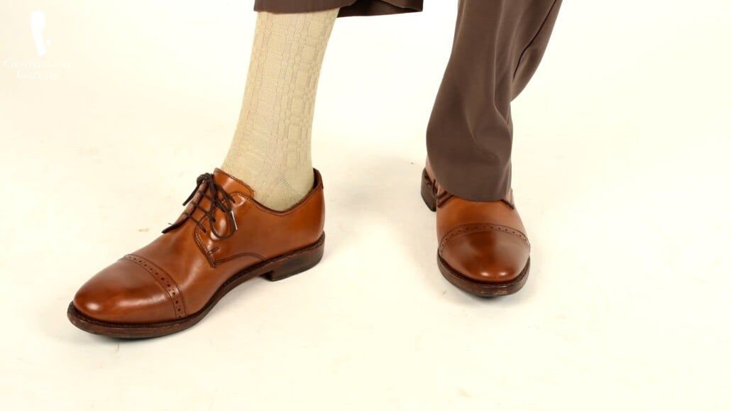 The bottom half of Preston's outfit also matches with the upper's colors.
