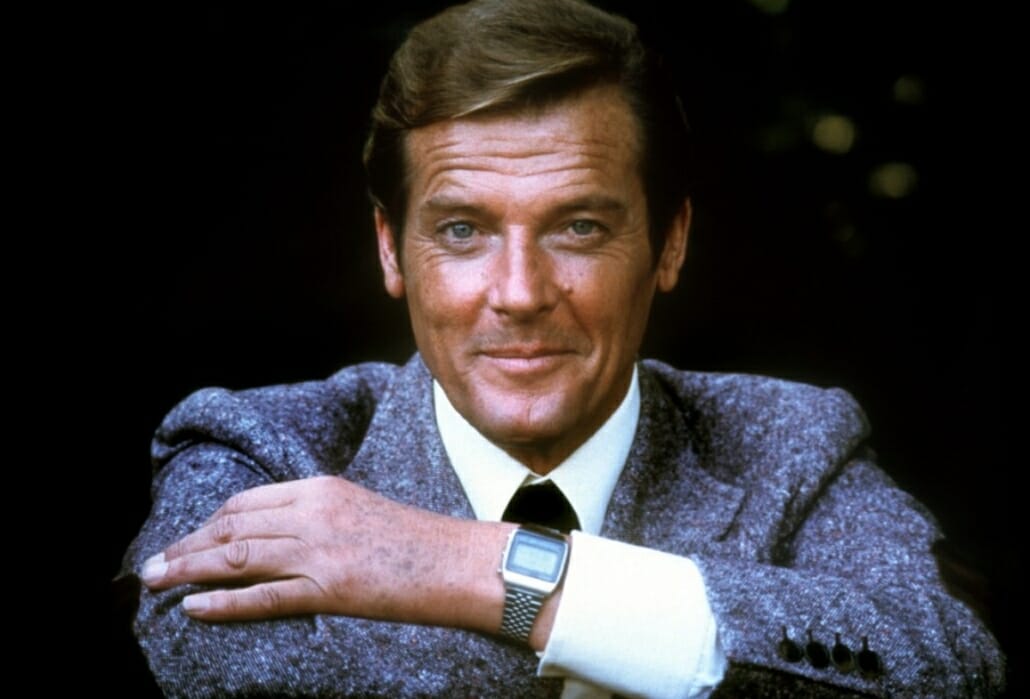 Roger Moore as Bond in Moonraker wearing a Donegal Tweed Suit - note his digital watch