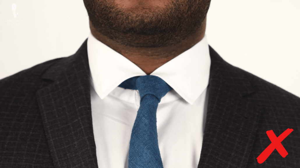 A tie knot that is too small