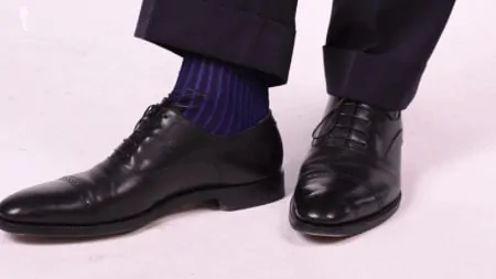 This pair of black oxfords work well with a Navy Single Breasted Suit