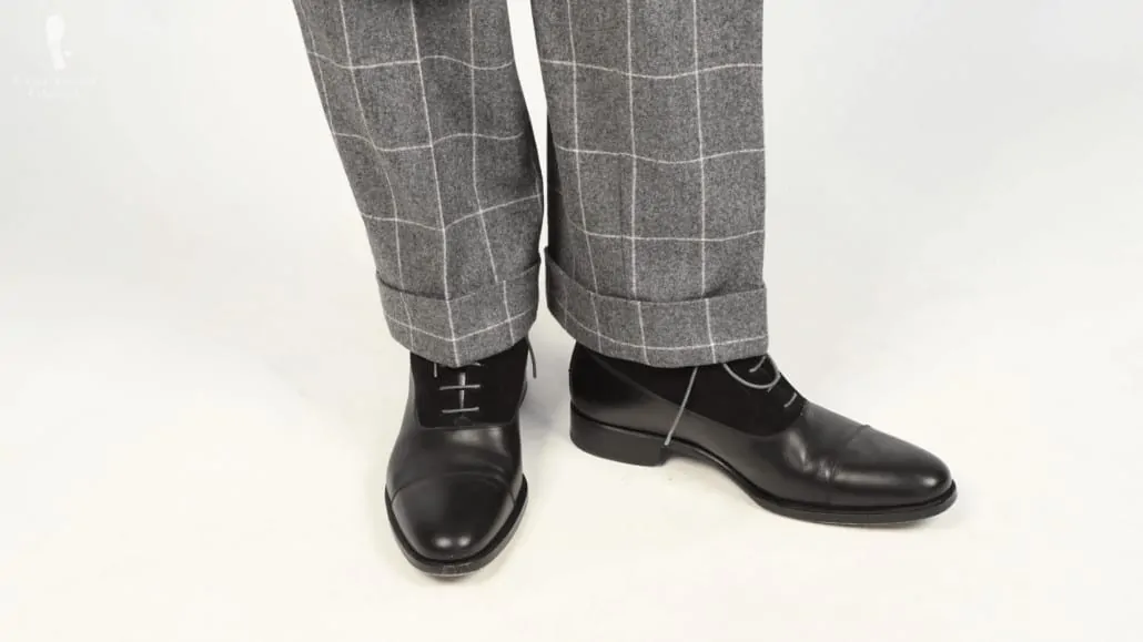 Gray windowpane suit with black balmoral boots