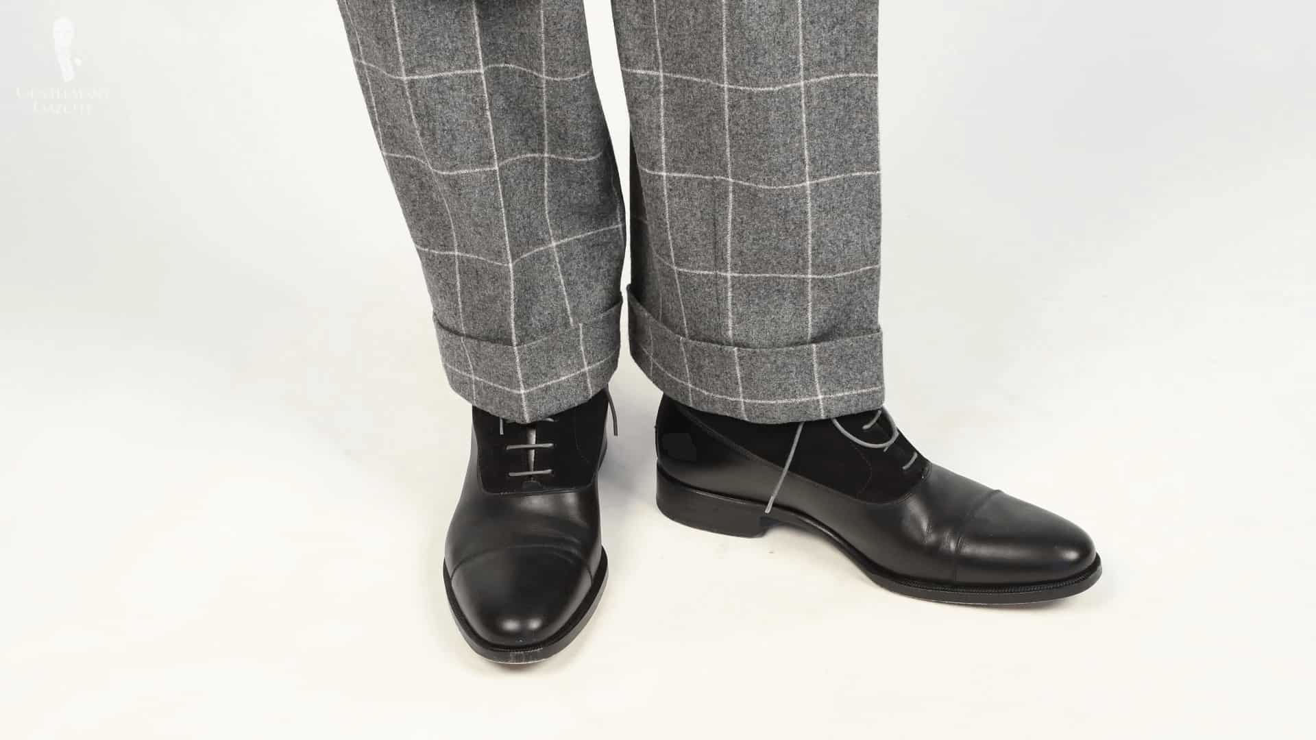 suit with black boots