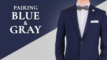 Preston wears an ensemble consisting of a medium-blue suit jacket and gray checked trousers, over a shirt with a blue-and-black microgrid on a white ground, along with other blue and gray Fort Belvedere accessories; test reads, "Pairing Blue & Gray"