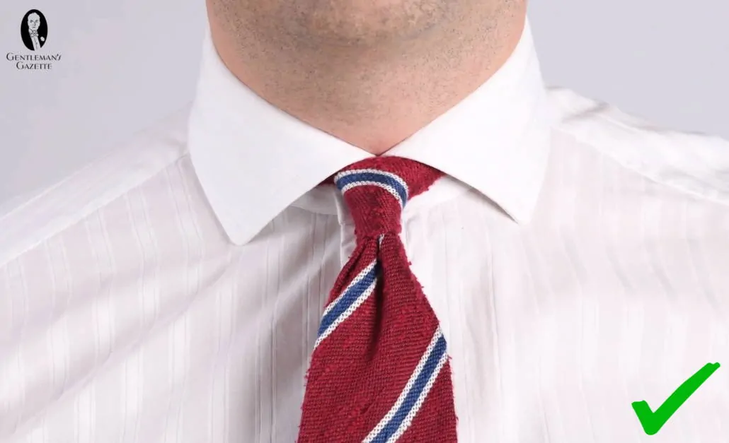 A Kelvin knot, shown here with the Shantung Striped Dark Red, Blue and White Silk Tie from Fort Belvedere