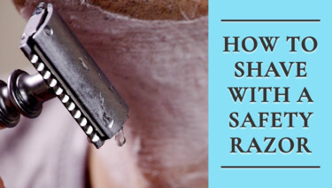 A close-up of a man shaving his neck, using a safety razor and shaving cream; text reads, "How to Shave with a Safety Razor"