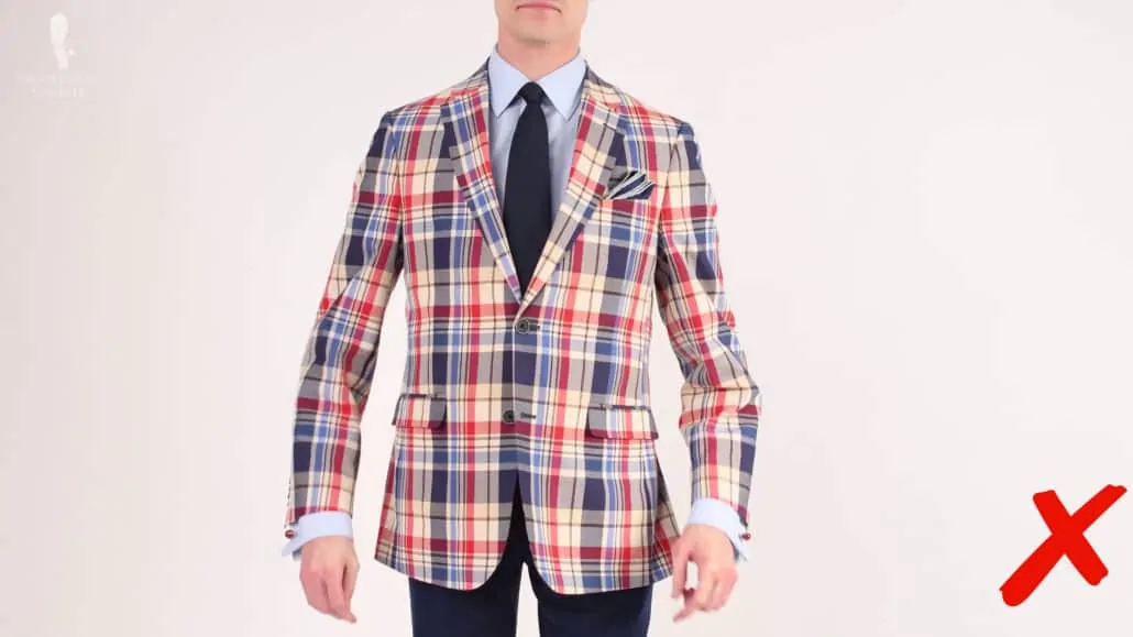 A brightly colored, checked jacket's would be too bold to pair with jeans