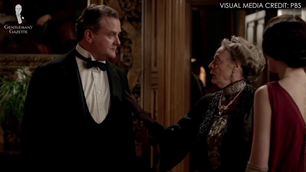 Lady Grantham telling her son that she was mistaking him for a waiter because he wore a black tie outfit rather than the traditional white tie tailcoat.