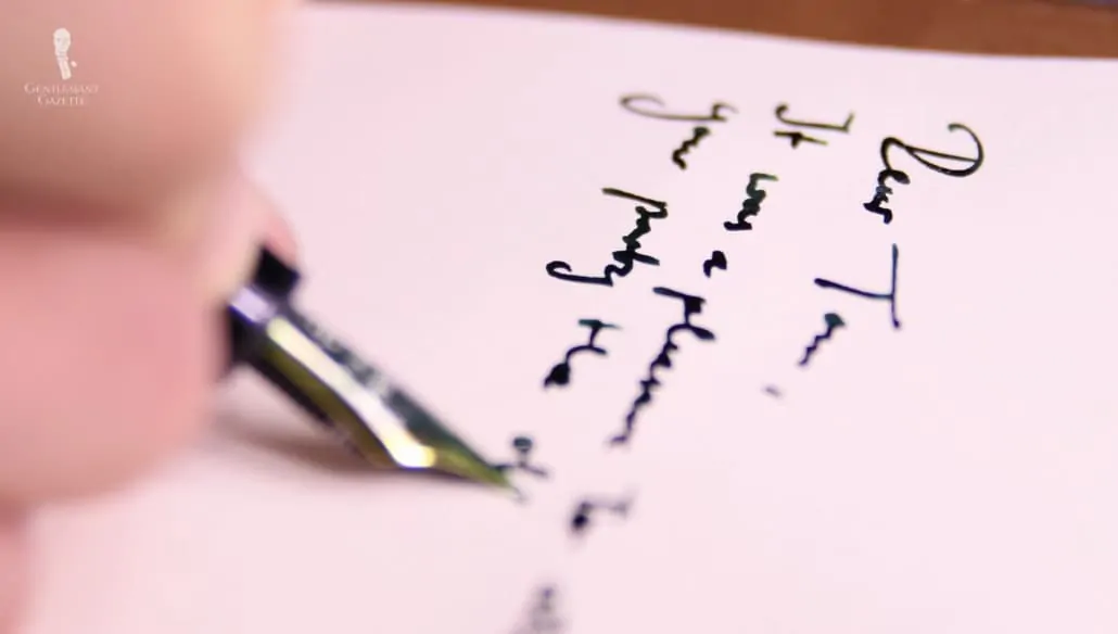A handwritten note is a gesture that every gentleman should make. Nib writing on paper