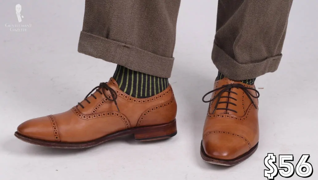 This Meermin shoes retail for $195, Raphael got it for $56 (Pictured: Mid Brown and Green Shadow Stripe Ribbed Socks from Fort Belvedere)