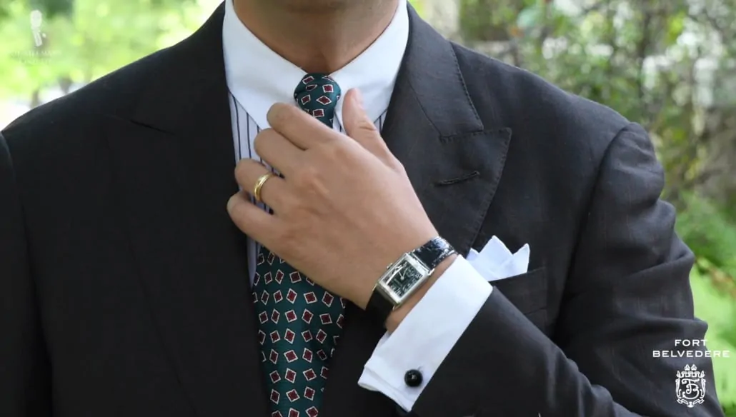 Raphael wearing his vintage Reverso watch from Jaeger-LeCoultre combined with Fort Belvedere accessories, keeping everything harmonious.