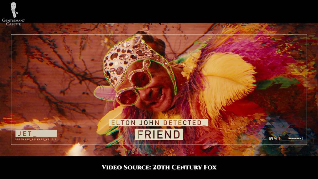 Elton John in what can only be descibed as a peacock outfit. 