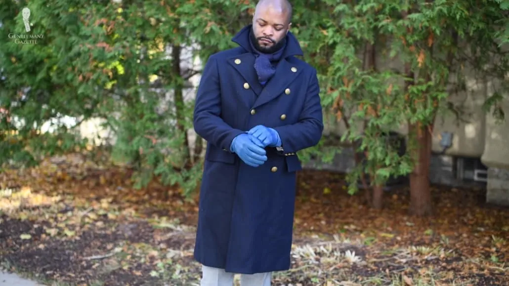 Kyle wearing his navy overcoat with gold buttons from Banana Republic. (Gloves and scarf from Fort Belvedere.