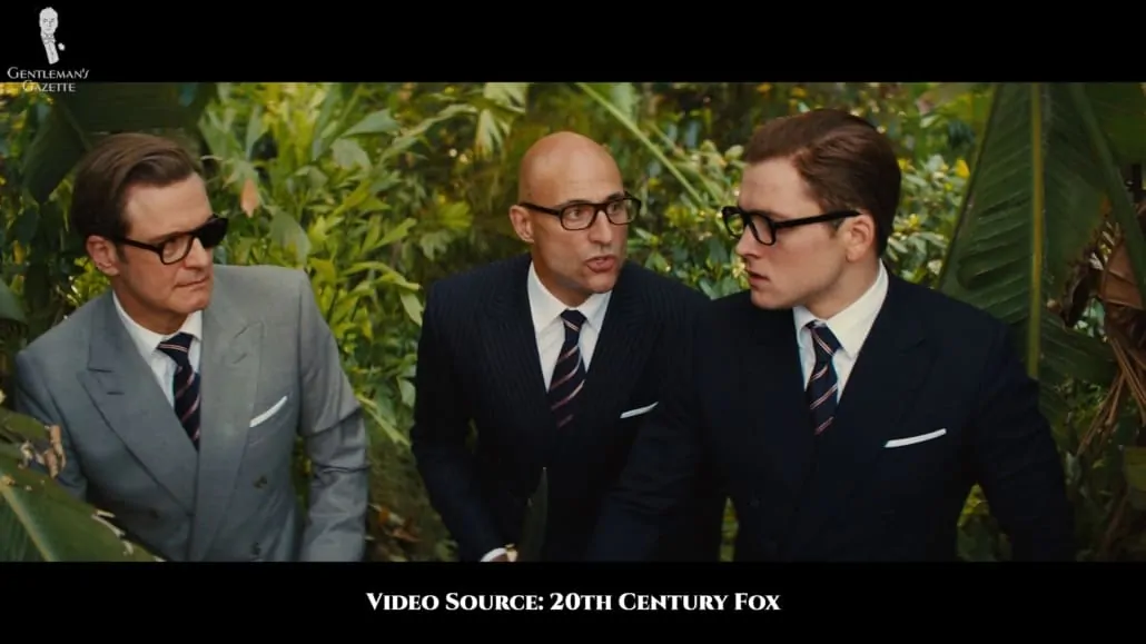 Merlin, Harry, and Eggsy all wearing the standard KIngsman repp tie.