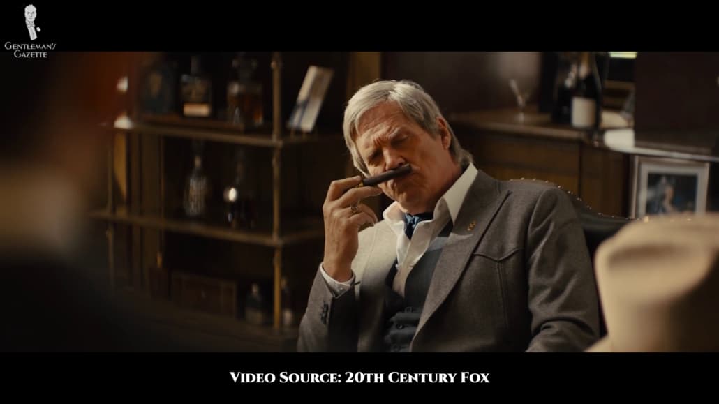 Champagne in a western-style grey jacket ensemble.