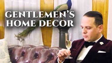 Cover showing Sven Raphael Schneider holding a glass of champagne on a Chesterfield sofa.