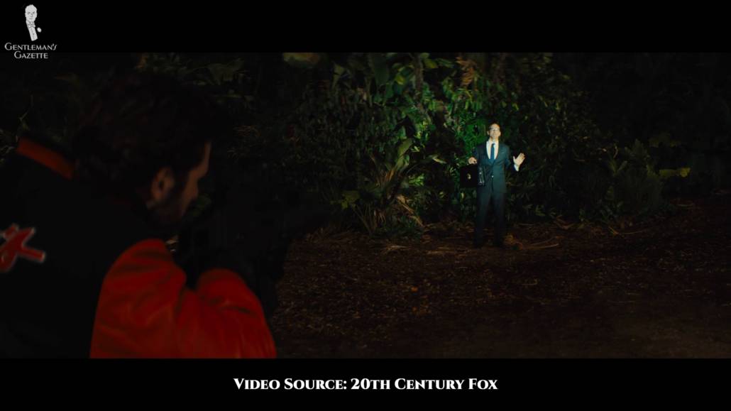 The lawyer named Pruitt wearing a charcoal suit ensemble.