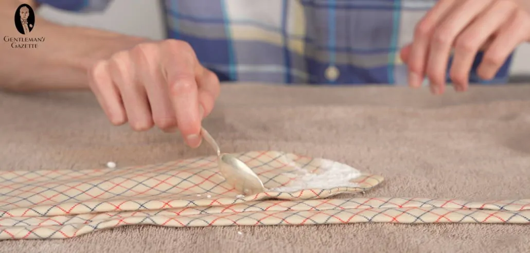 Create a pile of baking soda or cornstarch on an old stain