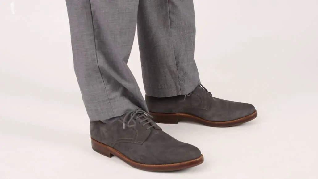 A pair of gray suede shoes will work in both casual and business casual setting.