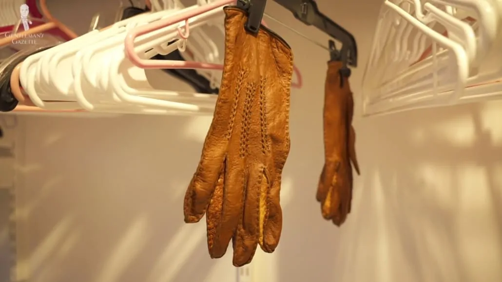 You can hang your gloves and let them air dry instead of using artificial heat such as a hairdryer or radiator. 