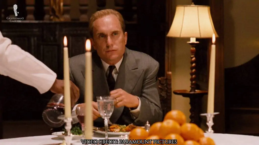 Tom Hagen at dinner wearing the same gray suit.