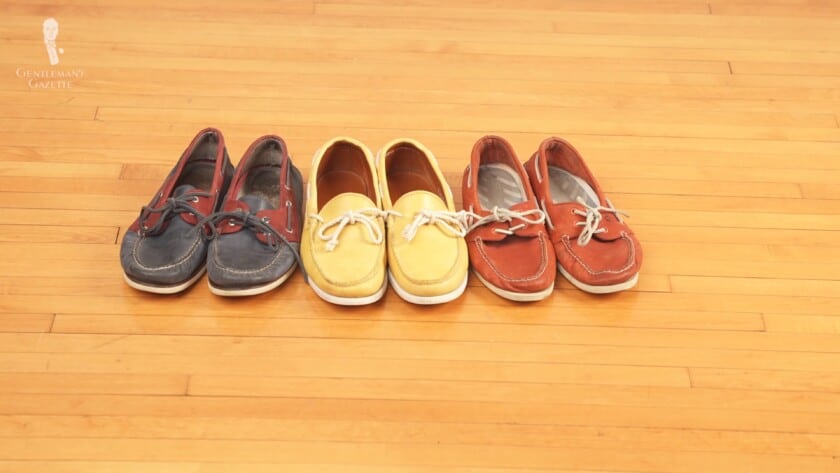 Blue, yellow, and orange pairs of boat shoes