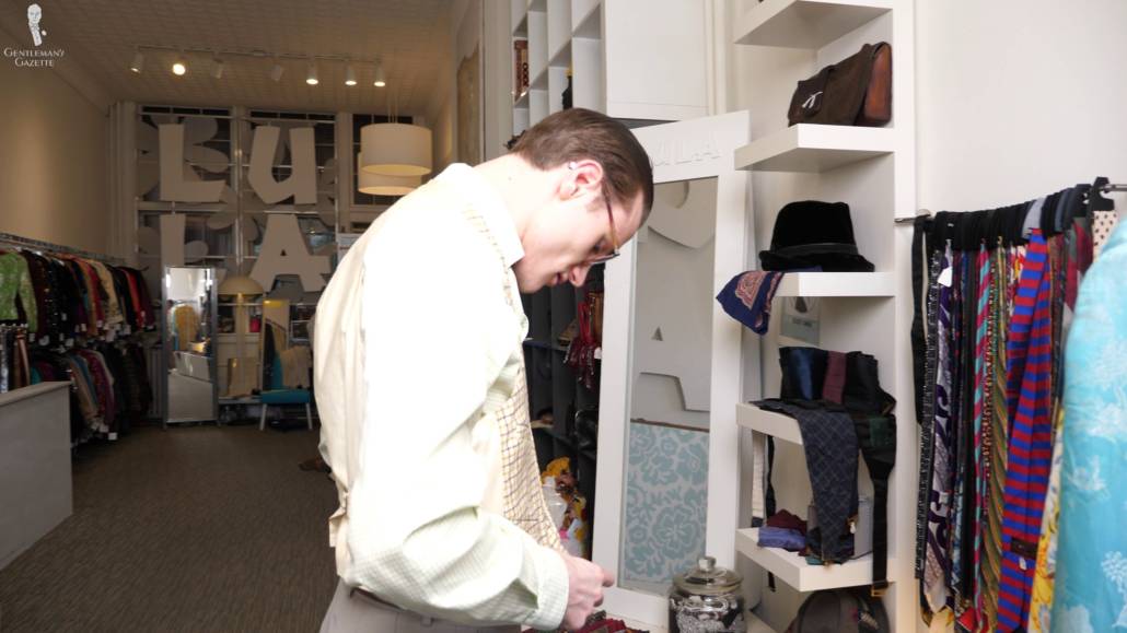 Preston checking out some accessories at a local store